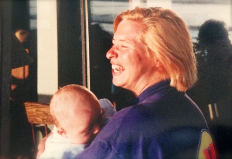 An old photo of a woman and her daughter.