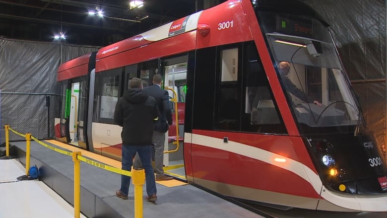 A model of a red LTR with city of Calgary branding on the side and front. 