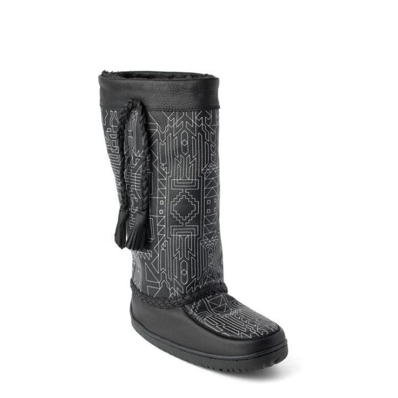 Manitobah Mukluk black leather boot with a thin-lined geometric design printed on its exterior in white.