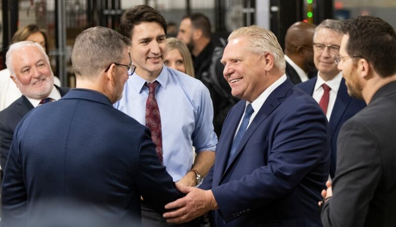 Prime Minister Justin Trudeau and Premier Doug Ford tour the General Motors CAMI assembly plant in Ingersoll, Ont., on Monday, December 5, 2022. Trudeau and Ford marked a Canadian milestone Monday, celebrating the launch of the country's first full-scale electric vehicle manufacturing plant.