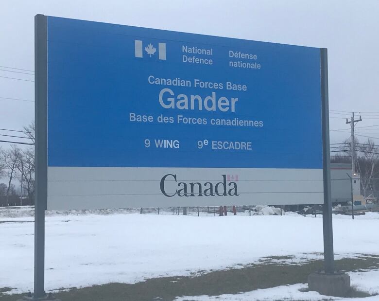 A large blue and gray sign reads Canadian Forces Base Gander.