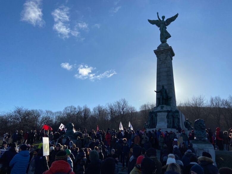 Protesters gathered at the Mont-Royal statue in Montreal