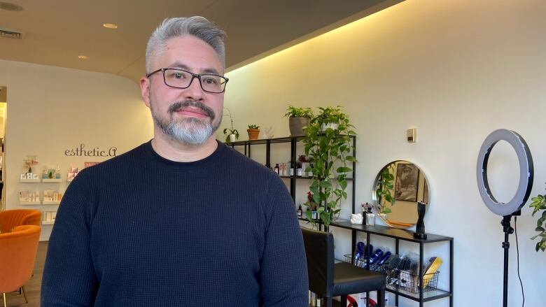 Man standing in hair salon