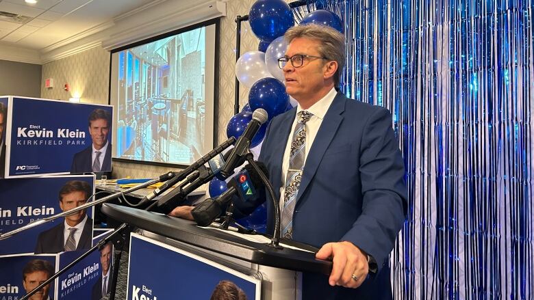 Progressive Conservative Kevin Klein speaks to supporters after his close victory in the Kirkfield Park byelection in west Winnipeg on Tuesday, Dec. 13, 2022.