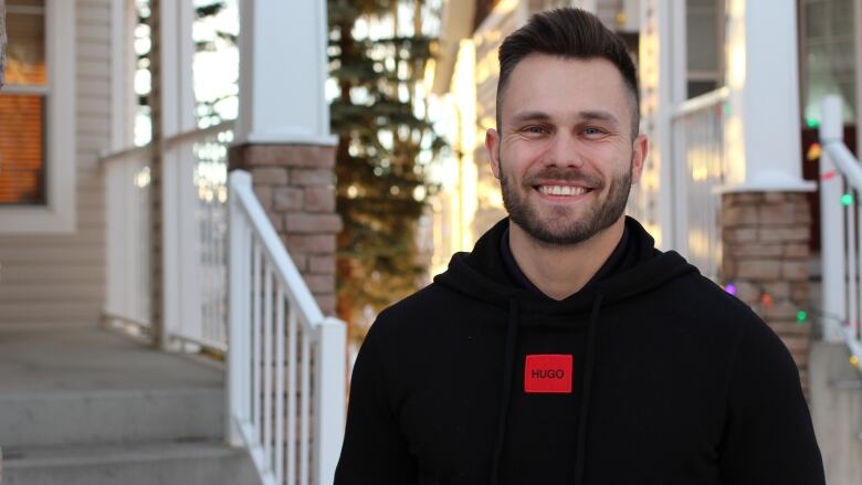 David Yarranton is pictured outside his home in Calgary.