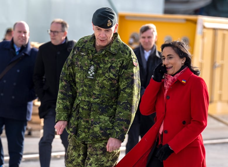 Defence Minister Anita Anand, right, walks with Gen. Wayne Eyre, chief of defence staff, as they attend an announcement in Halifax on Friday, Nov.18, 2022. Halifax has been selected to be the host of NATO's North American regional office for defence innovation.