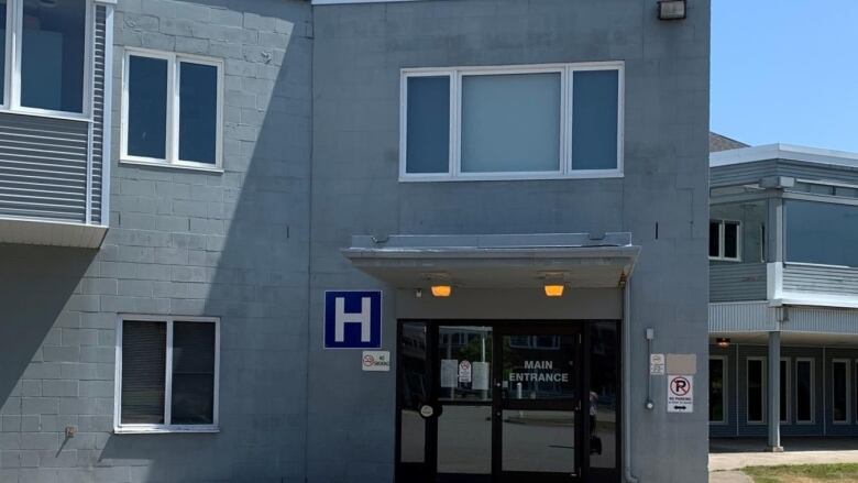 The front entrance of a small hospital.