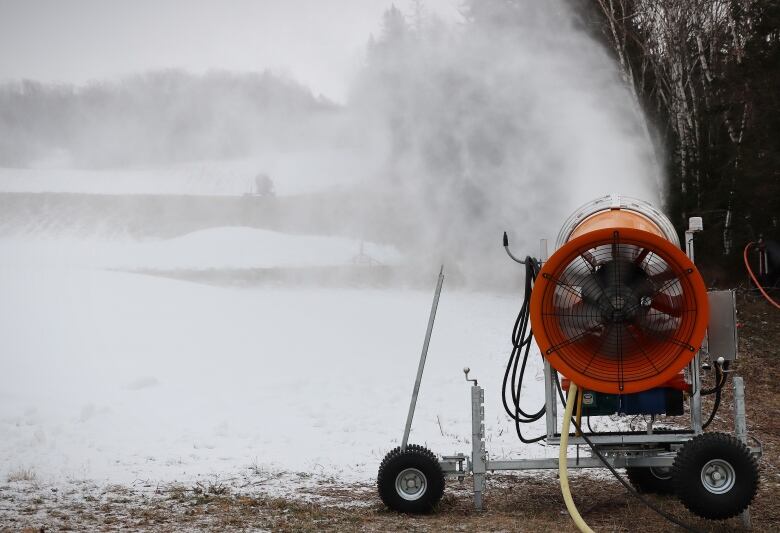 The snow cannons were working hard on Wednesday to add some white to the green hills at Ski Ben Eoin, but by Thursday they had to shut down due to warmer temperatures.