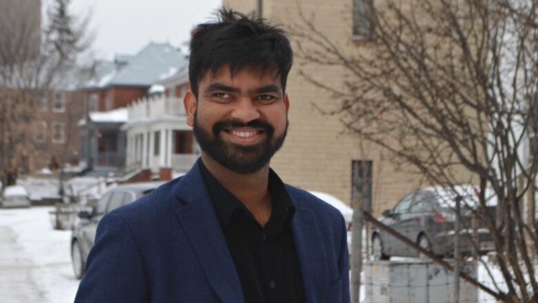 Abu Hena Mostofa Kamal, age 23, smiles on the street in Thunder Bay, Ont., where he's lived since August 2018. He moved to Canada from Bangladesh in 2018. After a recent hearing at federal court, he's found out he gets to stay in Thunder Bay while he awaits his permanent residency application to be processed.