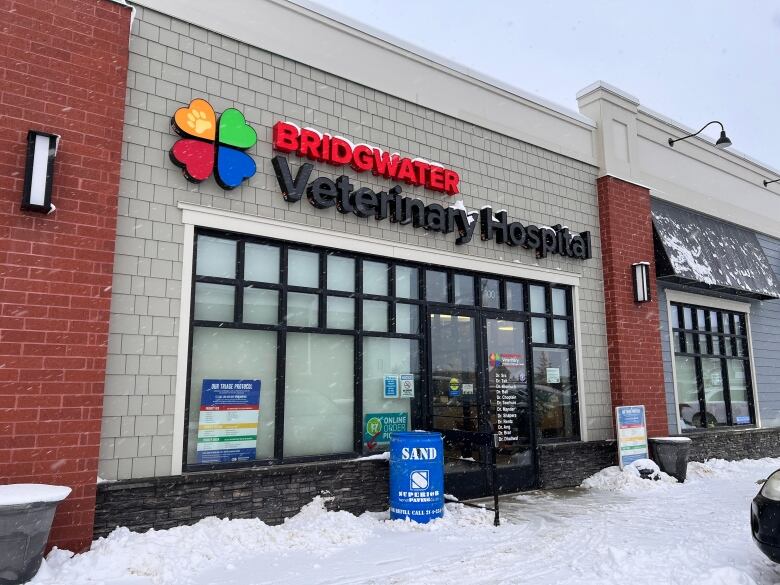 Exterior of a building with sign saying Bridgwater Veterinary Hospital, snow in foreground.