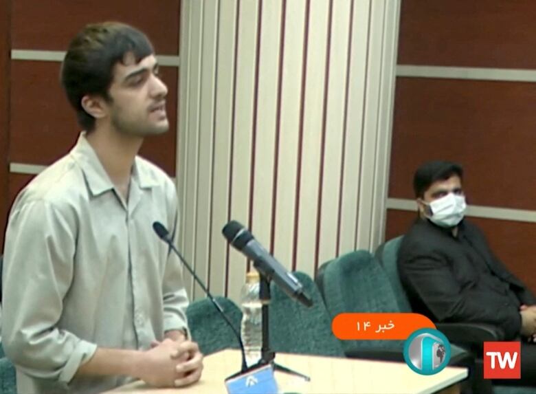 Mohammad-Mehdi Karami, is seen appearing in a Tehran court, in December 2022.