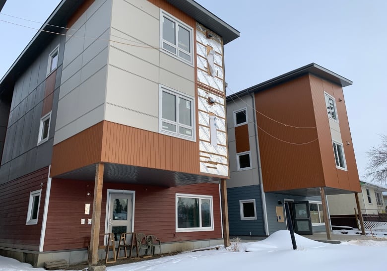 Two three-storey residential buildings.