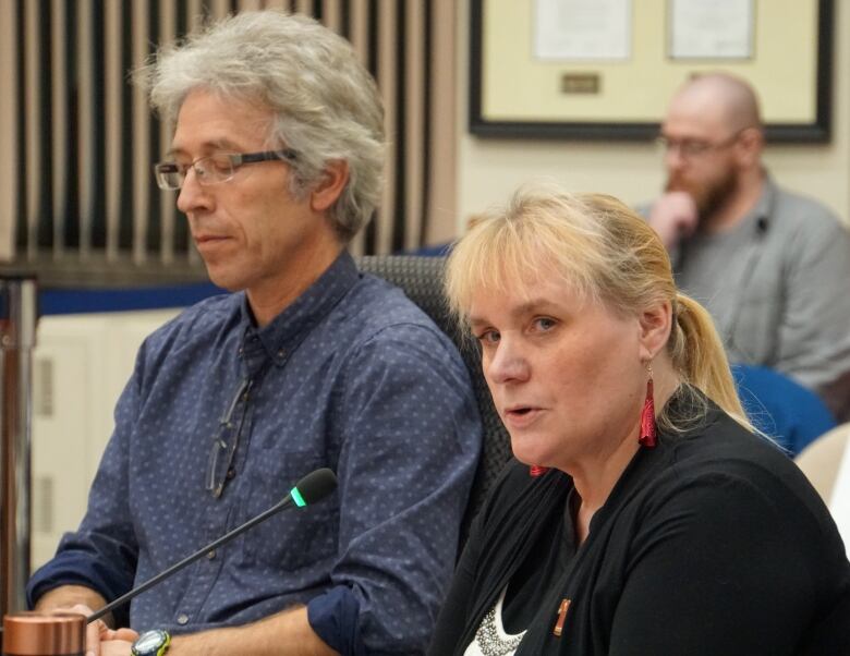 Paul Berger and Tracey MacKinnon of Poverty Free Thunder Bay speak during the City of Thunder Bay's public pre-budget deputation meeting on Thursday night. They were appealing to council not to cut the Affordable Access Pilot Program for Transit, which is slated to launch this July.