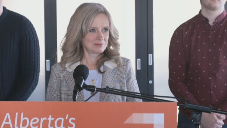 Alberta NDP leader Rachel Notley stands in front of a podium at a news conference in Calgary on Jan. 18, 2023