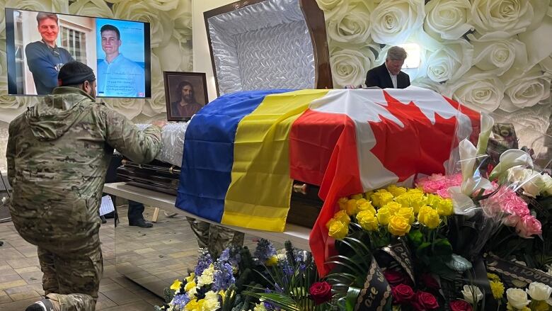 Tsekhmistrenko's body laid in this casket in front of about 250 people at a funeral home in Kyiv, Ukraine.