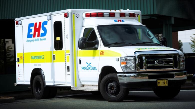 A parked ambulance shows the EHS logo.