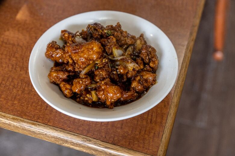 A dish of chili chicken with gravy from Wong's Asian Cuisine.