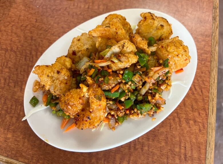 A dish of wok-fried spicy garlic shrimp at Wong's Asian Cuisine.