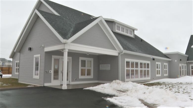 Exterior view of mental health structured programming facility, with snow on the ground.