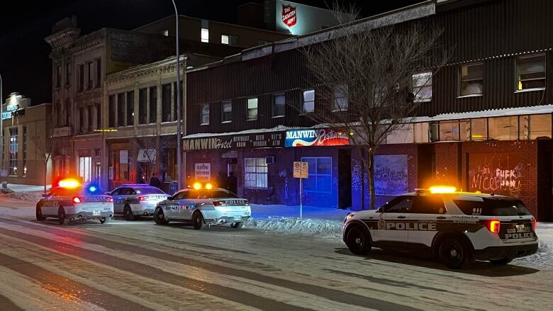 Two people were seen being taken to hospital after an incident at the Manwin hotel Sunday night.