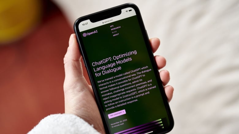 The ChatGPT website is seen on a smartphone. 