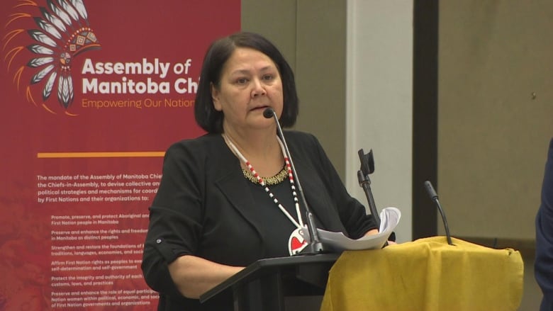 Cathy Merrick, Grand Chief of the Assembly of Manitoba Chiefs, speaks at a ceremony. 