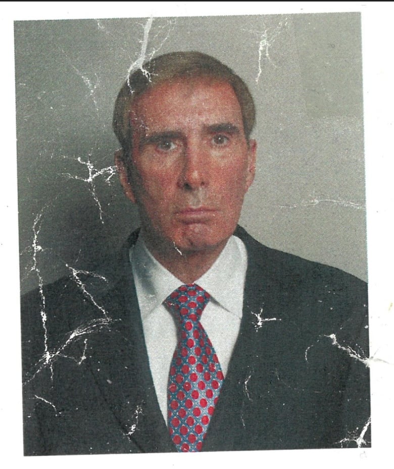  Wrinkled damaged photo of businessman.