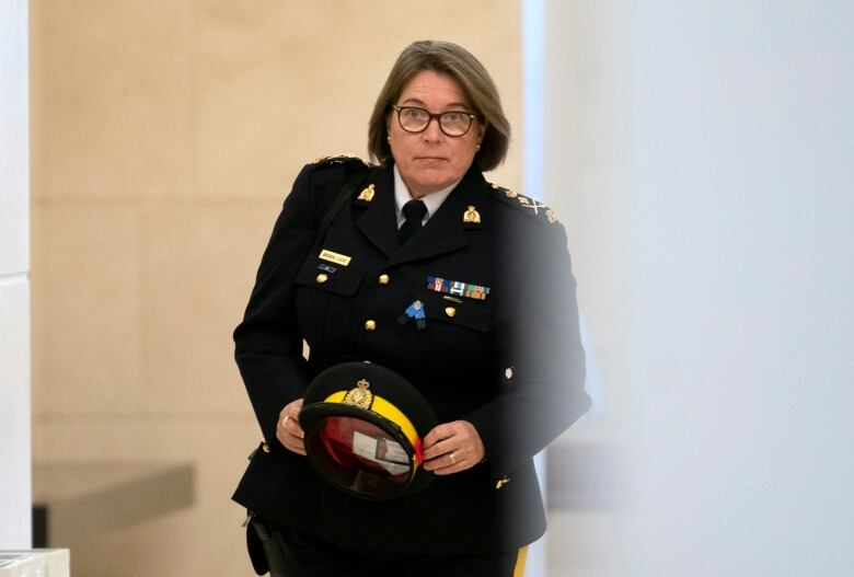 RCMP Commissioner Brenda Lucki  makes her way to the Standing Committee on Public Safety and National Security, in Ottawa, Monday, Oct. 31, 2022.