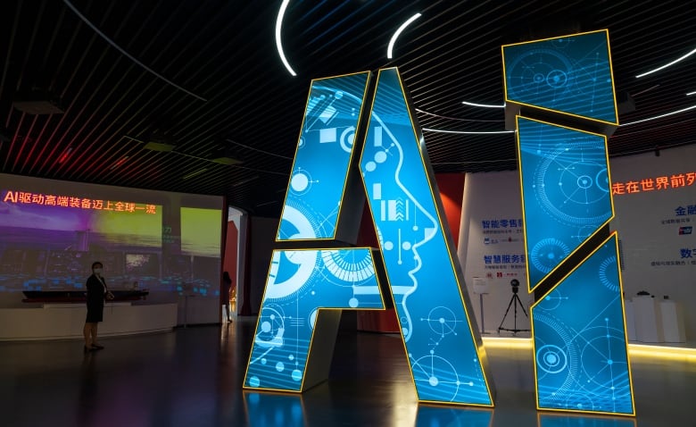 The blue letters AI, for Artificial Intelligence, are on display.