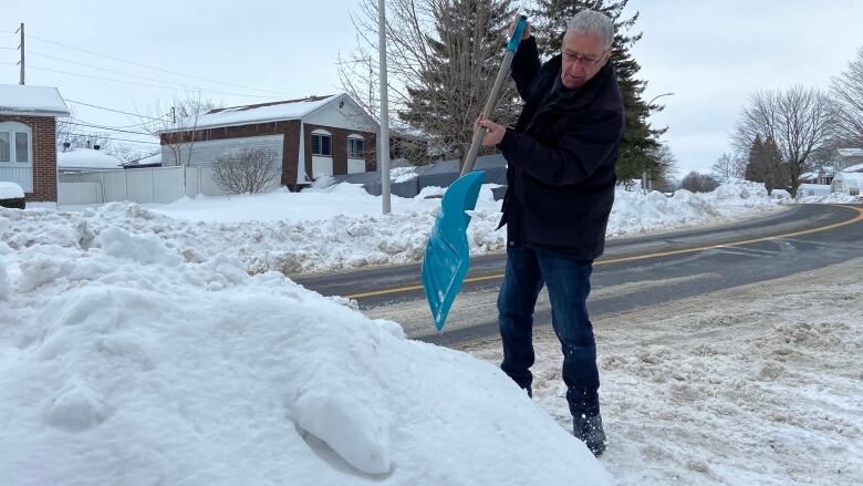 Man shoveling snow