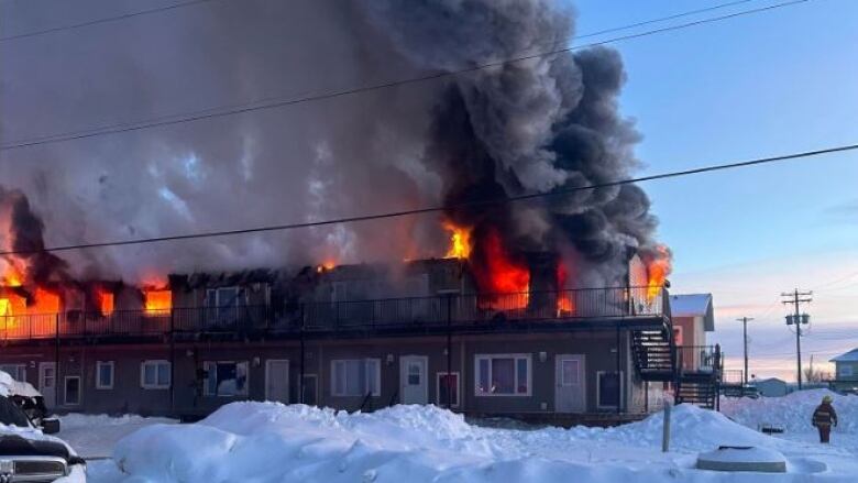 A northern Manitoba building burns.