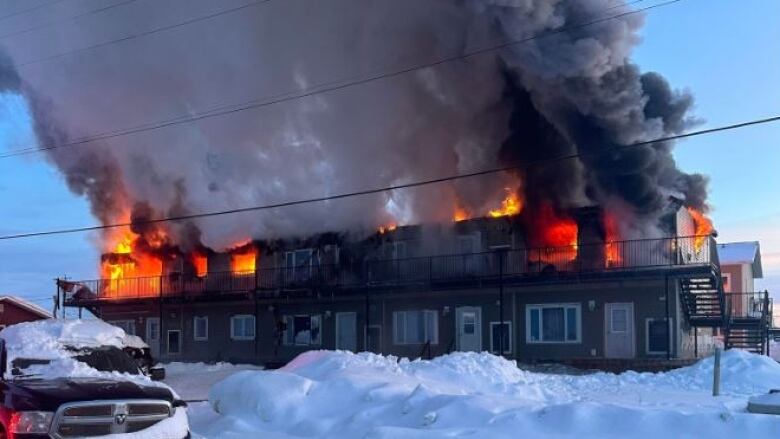 A residential apartment complex goes up in flames.