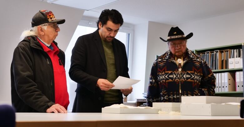 Members of the Haudenosaunee External Relations Committee Kenneth Deer, Brennen Ferguson and Clayton Logan at the Muse d'ethnographie de Genve (MEG).