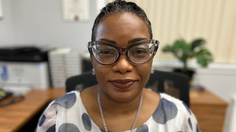 Closeup portrait of Ruth Pierre-Paul, director of the Bureau de la Communaut Hatienne de Montral.