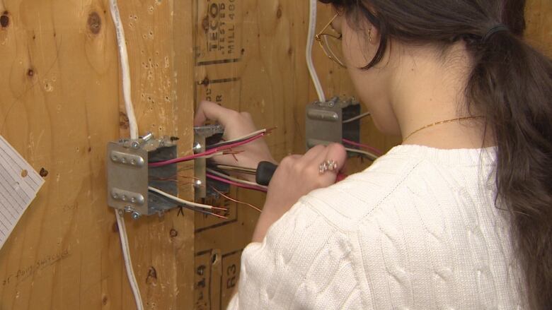 A student at Central Tech works on some wiring a part of an electrician pre-apprenticeship program. Many in the industry say Ontario needs more students in these programs.