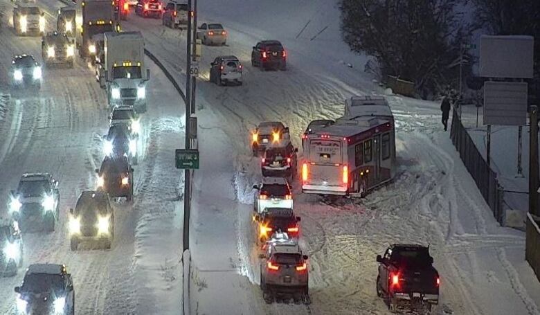 Calgary streets covered in snow, traffic struggling