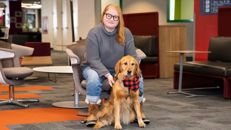 Georgia Pike, pictured here with her seeing eye dog Maggie, says she's traveled in and out of Toronto Pearson Airport many times, but her latest experience prompted her to come forward about 