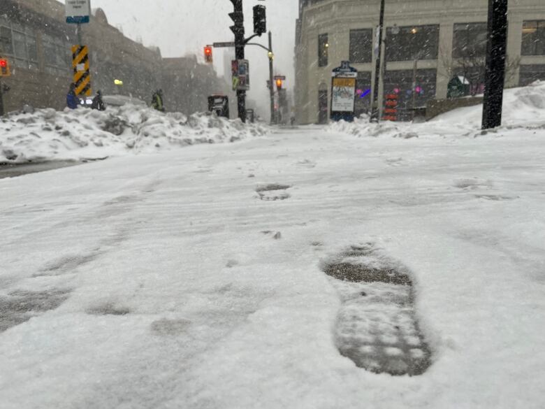 A footprint in the snow.