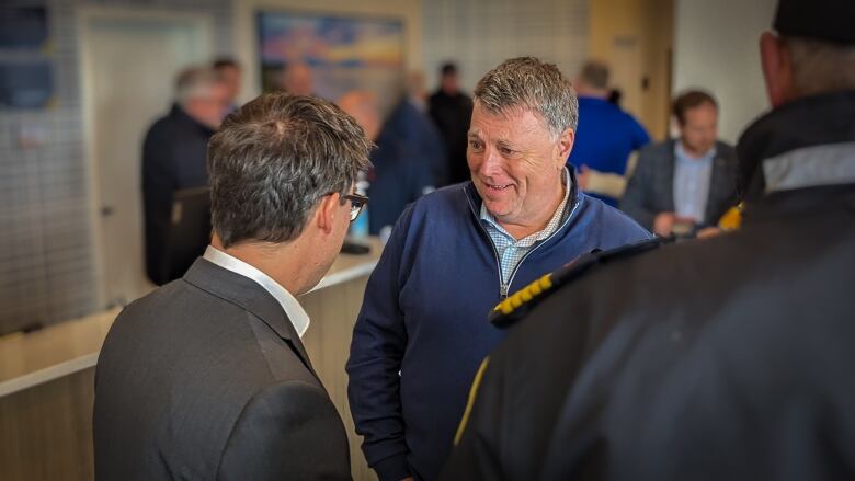 P.E.I. Progressive Conservative Leader Dennis King in a crowded room.