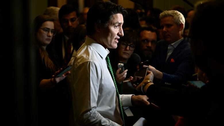 Prime Minister Justin Trudeau speaks to reporters before heading into a meeting of the Liberal caucus, on Parliament Hill in Ottawa, on Wednesday, March 8, 2023.