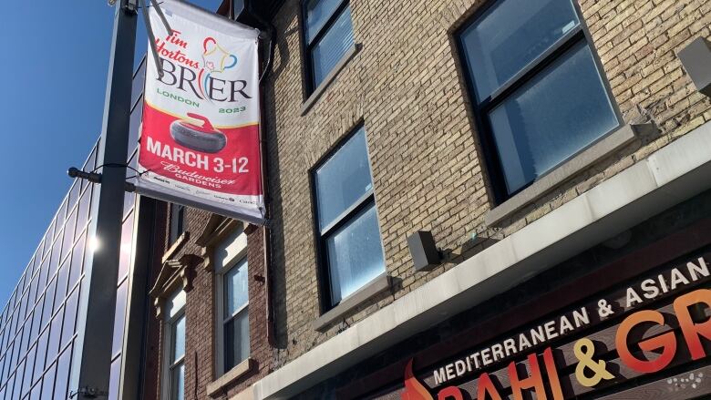 Brier 2023 flag in front of a restaurant