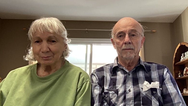 Ron and Diane Lindsay sit in their living room at their home in Ingersoll, Ontario. 