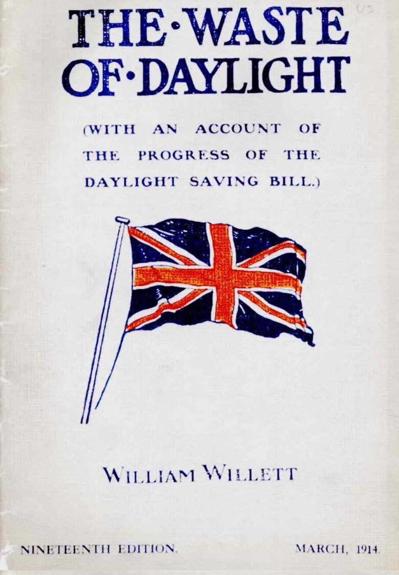 A cover of a pamphlet featuring the union jack flag on a pole, and titled The Waste of Daylight.