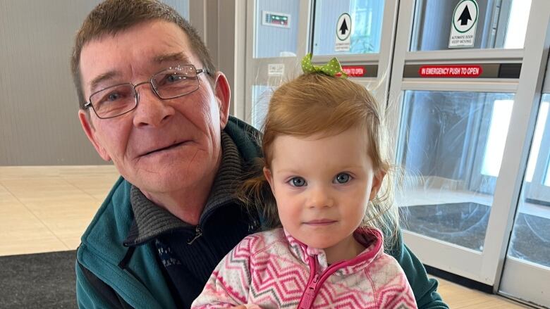   and his young daughter at a hotel in St. John's. , along with his wife and daughter, arrived in NL in February 2023. He was a fish harvester in Ukraine for 40 years and has been trying to find work in the NL fishery.