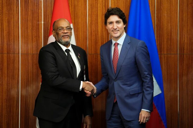 Prime Minister Justin Trudeau, right, takes part in a bilateral meeting with Prime Minister of Haiti Ariel Henry during the Conference of Heads of Government of the Caribbean Community (CARICOM) in Nassau, Bahamas, on Thursday, Feb. 16, 2023. 