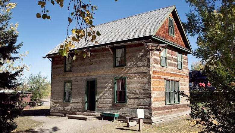 a wood building. the worn is very worn 