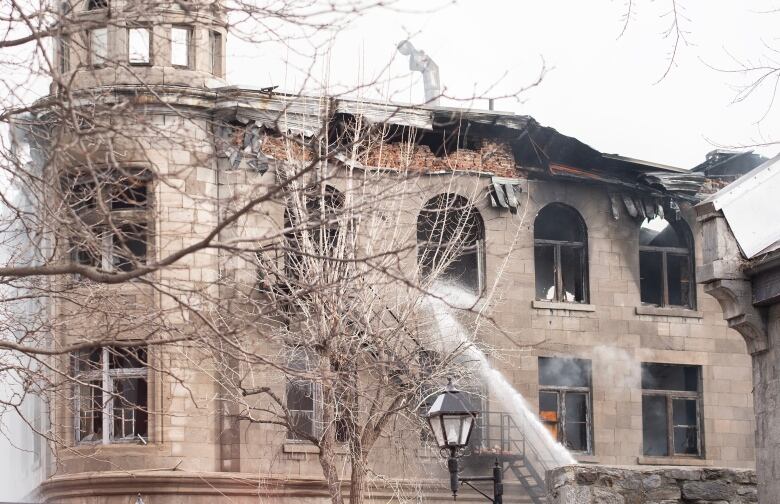 Water pouring into a building.