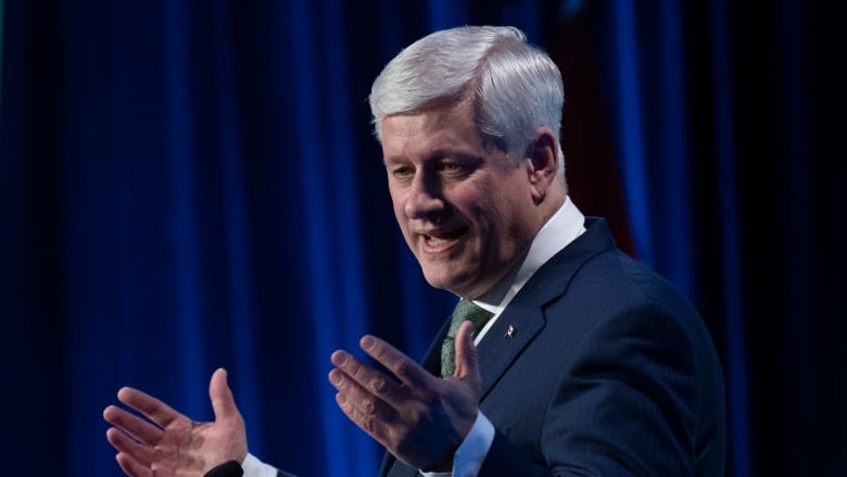 Former prime minister Stephen Harper delivers the keynote address at a conference, Wednesday, March 22, 2023 in Ottawa.