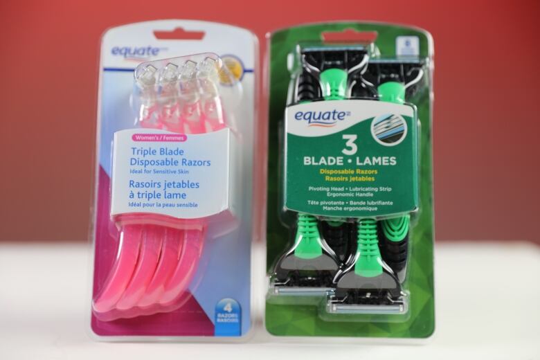 One package of pink disposable razors with three blades that says 