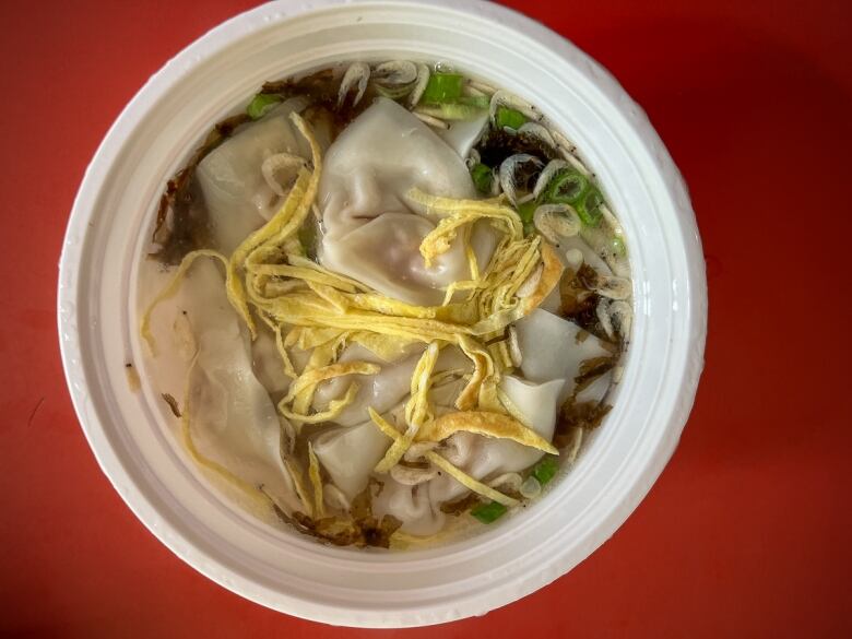 Dumplings in a broth at SHANGHAI SIU MAI YU. 